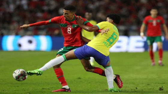 Brazil's midfielder Andrey Santos (R) fights for the ball with Morocco's midfielder Azzedine Ounahi during a friendly football match between Morocco and Brazil at the Ibn Batouta Stadium in Tangier on March 26, 2023. (Photo by Fadel Senna / AFP) (Photo by FADEL SENNA/AFP via Getty Images)