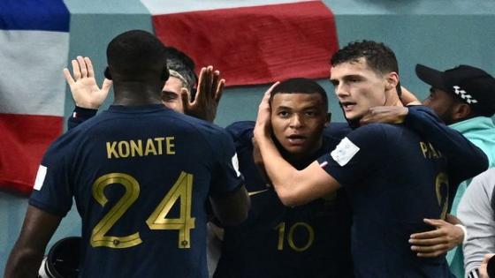 France's forward #10 Kylian Mbappe celebrates with teammates after he scored France's third goal during the Qatar 2022 World Cup Group D football match between France and Australia at the Al-Janoub Stadium in Al-Wakrah, south of Doha on November 22, 2022. (Photo by Jewel SAMAD / AFP)