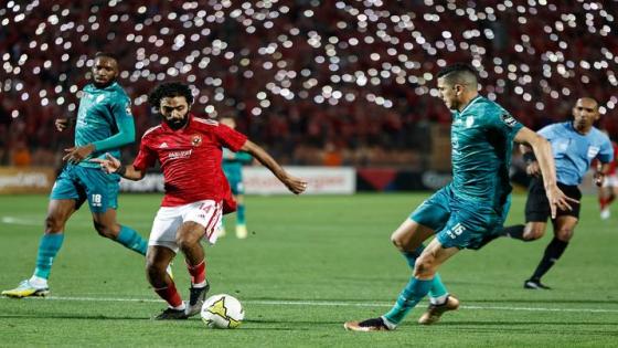 Ahly's Egyptian midfielder Hussein el-Shahat (2nd-L) is marked by Raja's Moroccan defender Mohamed Nahiri (R) during the CAF Champions League quarter-final football match between Egypt's Al Ahly and Morocco's Raja Casablanca at Cairo International Stadium in the Egyptian capital on April 22, 2023. (Photo by Khaled DESOUKI / AFP) (Photo by KHALED DESOUKI/AFP via Getty Images)
