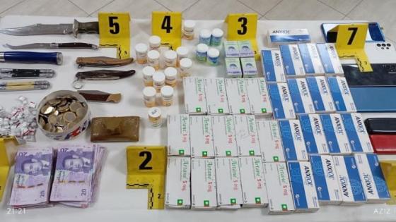 شرطة طنجة توقف شخصين وتضبط 1445 قرص مخدر وكمية من الشيرا